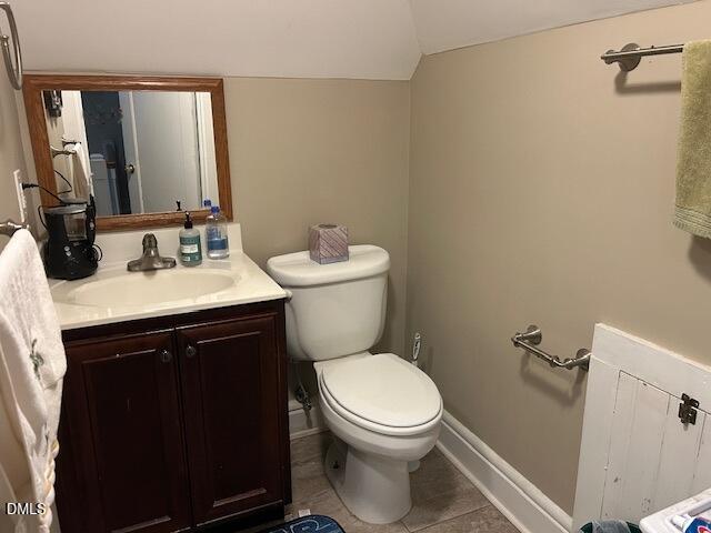 405 Sunset Avenue Clinton, NC 28328 - Photo 29 of 47 a bathroom with a sink vanity mirror and toilet