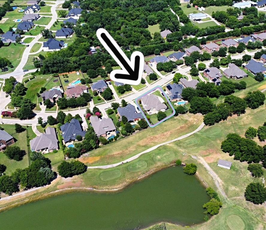 10601 Huffines Drive Rowlett, TX 75089 - Photo 27 of 29 Aerial view of property's location featuring property parcel outlined and nearby suburban area