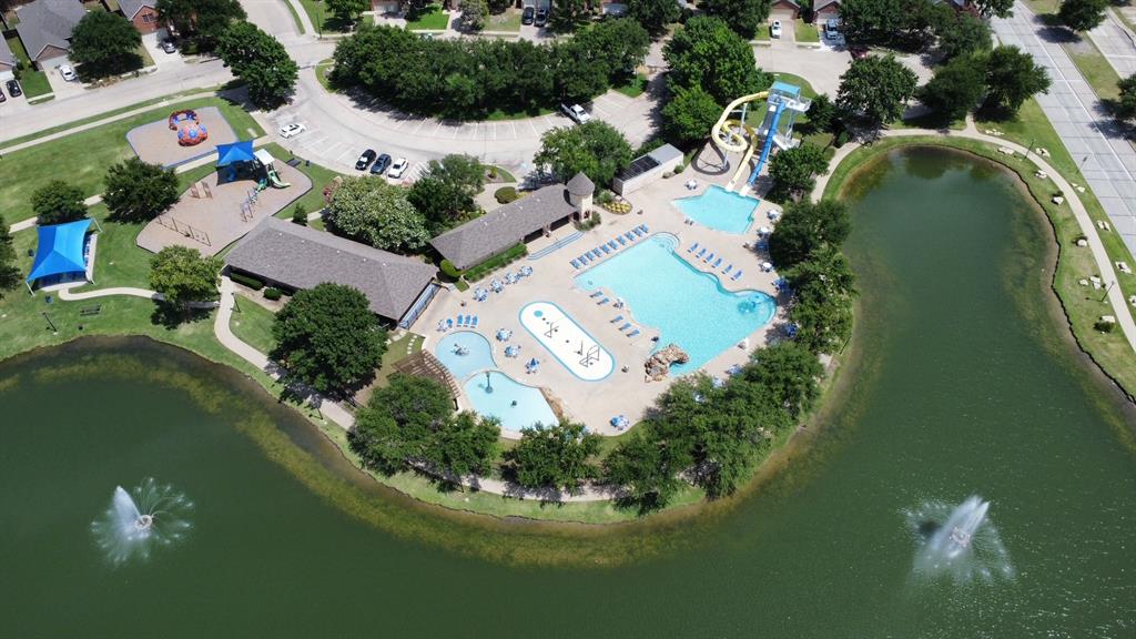 10601 Huffines Drive Rowlett, TX 75089 - Photo 29 of 29 an aerial view of a house with a lake view