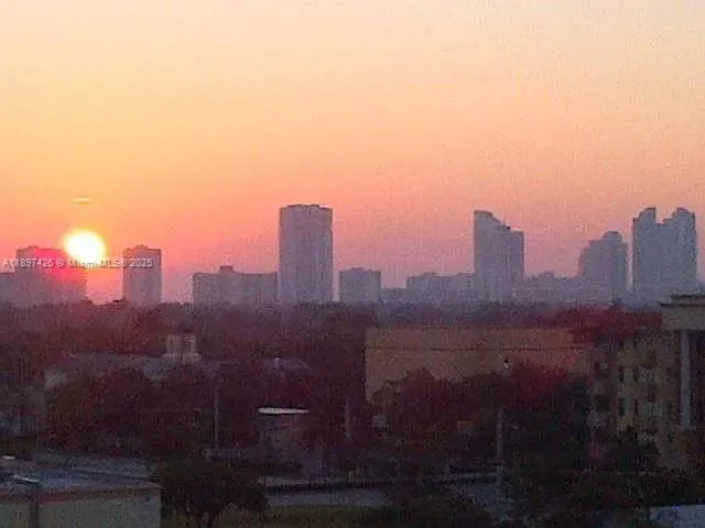a view of a city with tall buildings