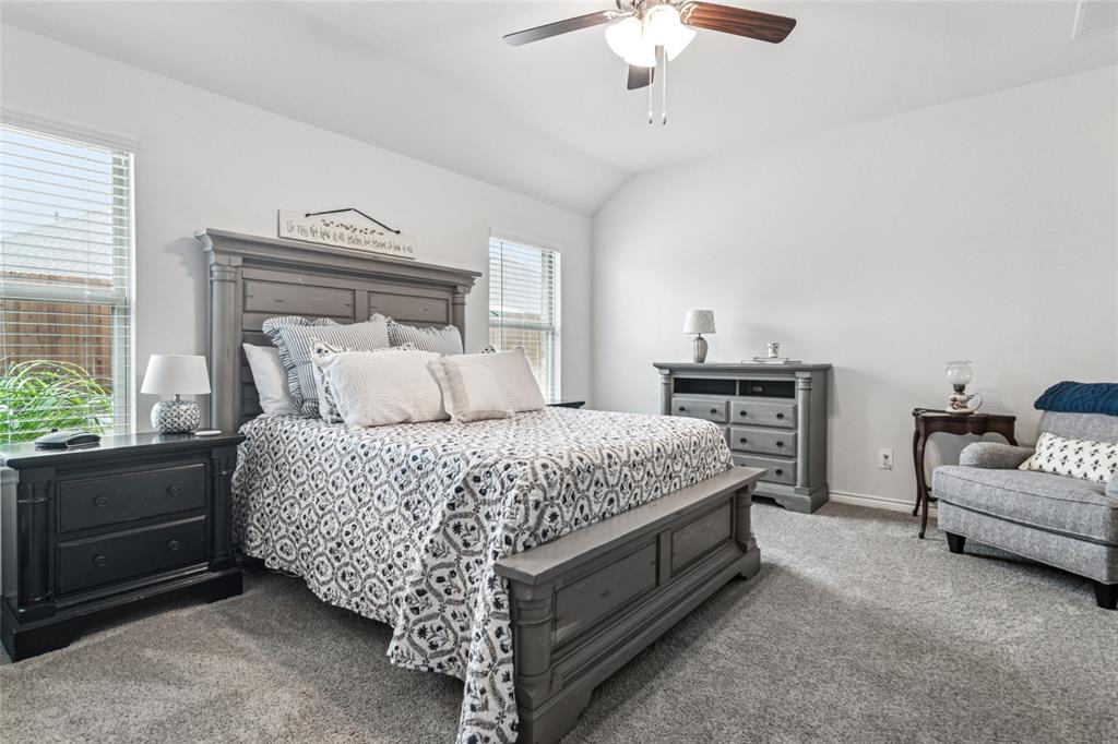 113 Lantern Road Caddo Mills, TX 75135 - Photo 13 of 25 a spacious bedroom with a bed and a couch