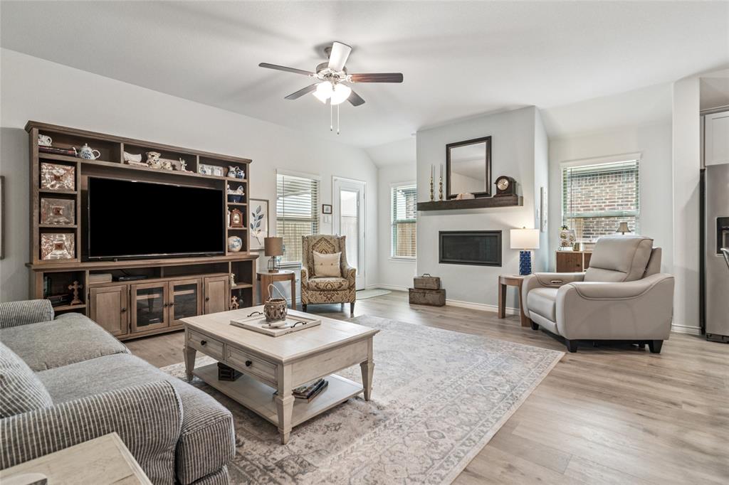 113 Lantern Road Caddo Mills, TX 75135 - Photo 4 of 25 a living room with furniture and a flat screen tv