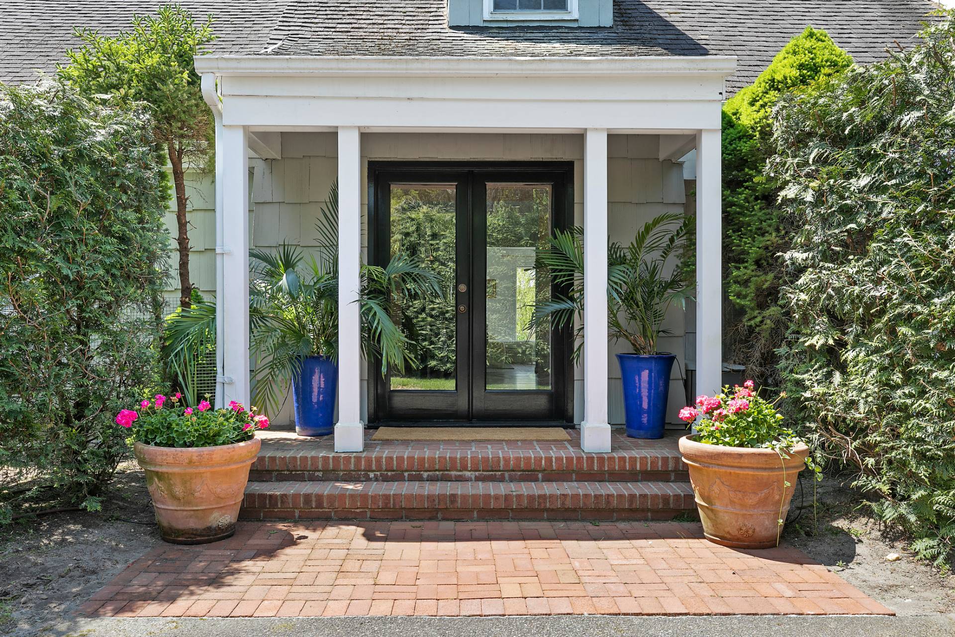 a view of house outdoor space with potted plants