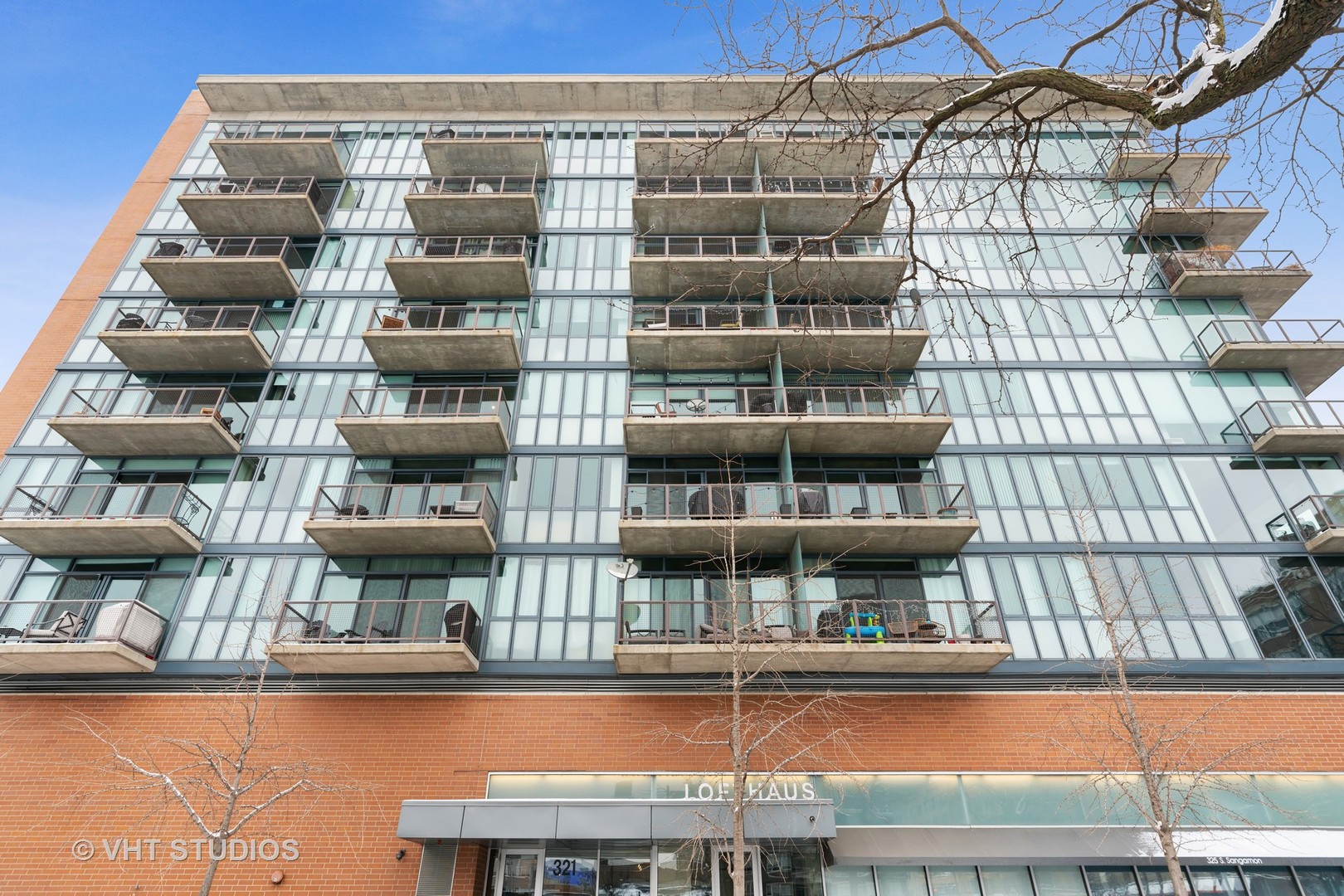 a front view of a building with glass windows
