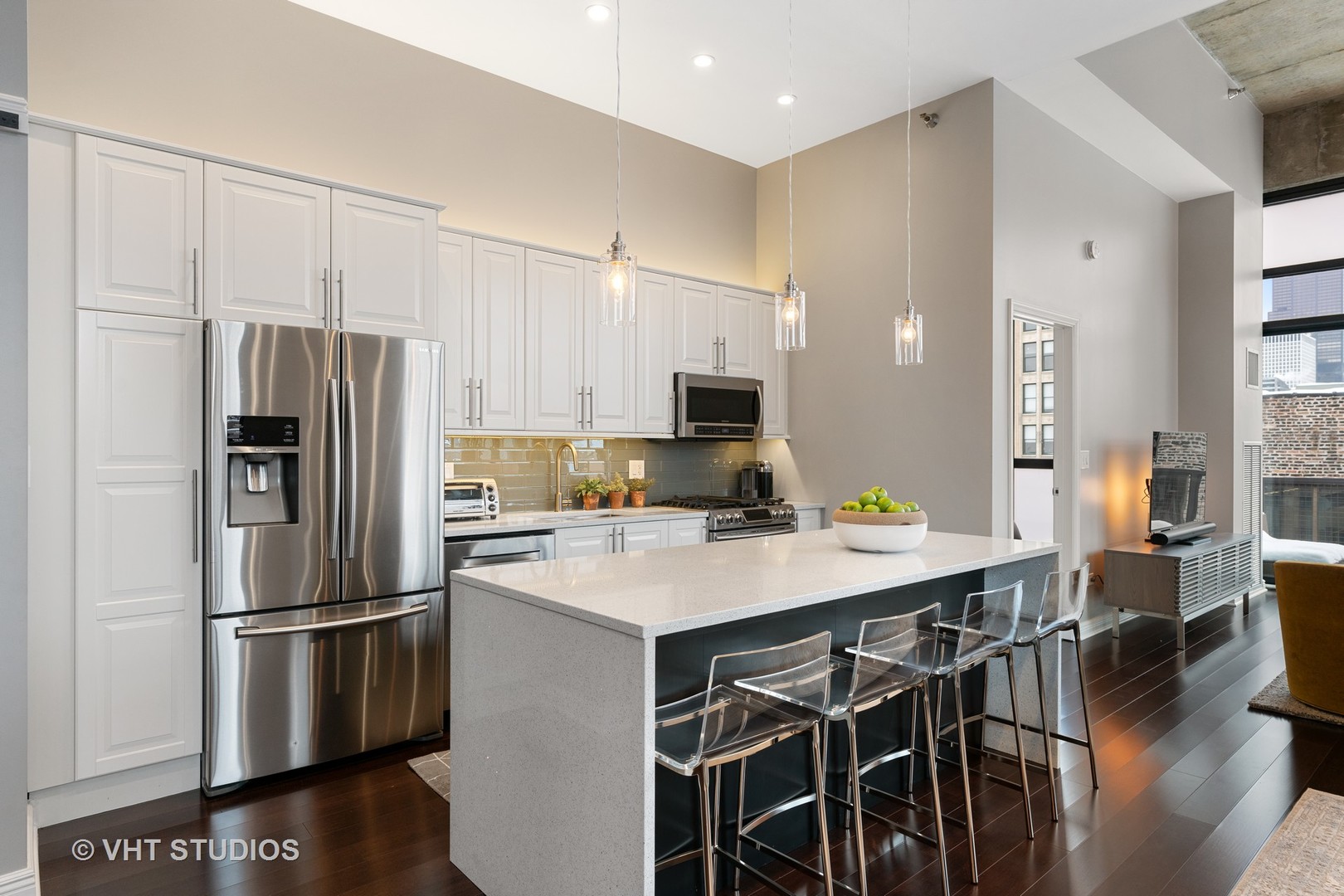 321 South Sangamon Street, Unit 906 Chicago, IL 60607 - Photo 4 of 11 a kitchen with stainless steel appliances a refrigerator and a stove top oven