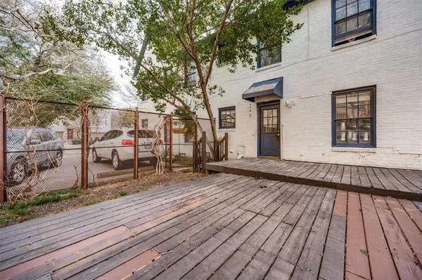 a view of a house with a wooden roof