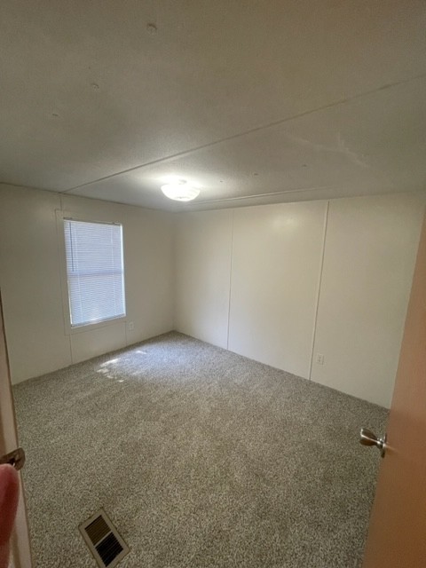 7 Thomas Circle Hickman, TN 38567 - Photo 7 of 10 an empty room with windows