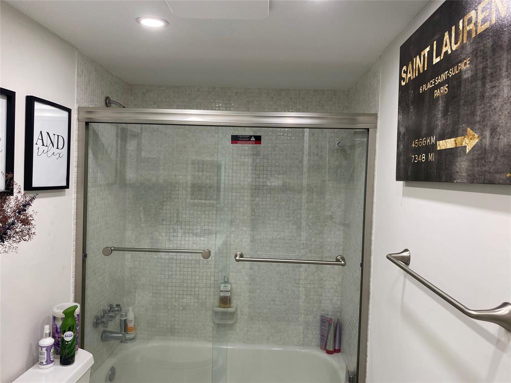 3031 Northeast 51st Street, Unit 305W Fort Lauderdale, FL 33308 - Photo 5 of 11 a bathroom with a shower