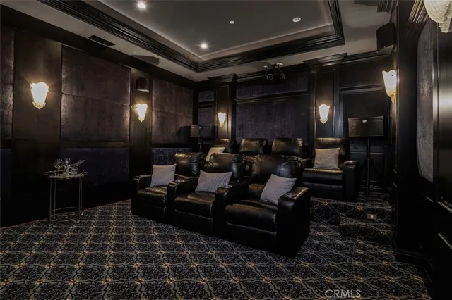 a bathroom with a granite countertop tub sink and mirror