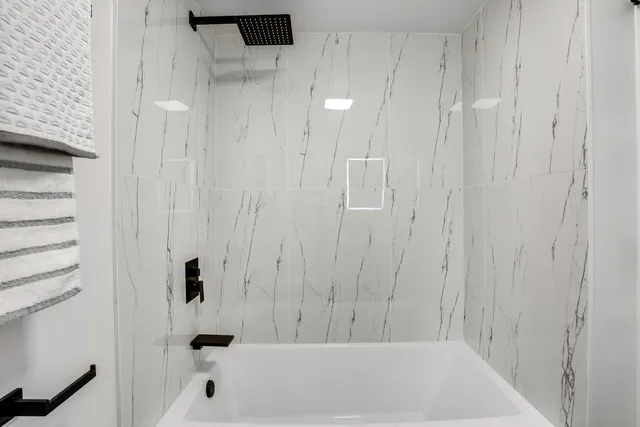 a bathroom with a bathtub