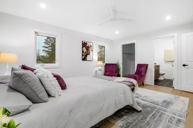 a bed room with a bed and a couch