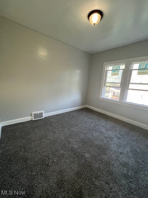 1842 Colonnade Road Cleveland, OH 44112 - Photo 32 of 47 Spare room with dark carpet
