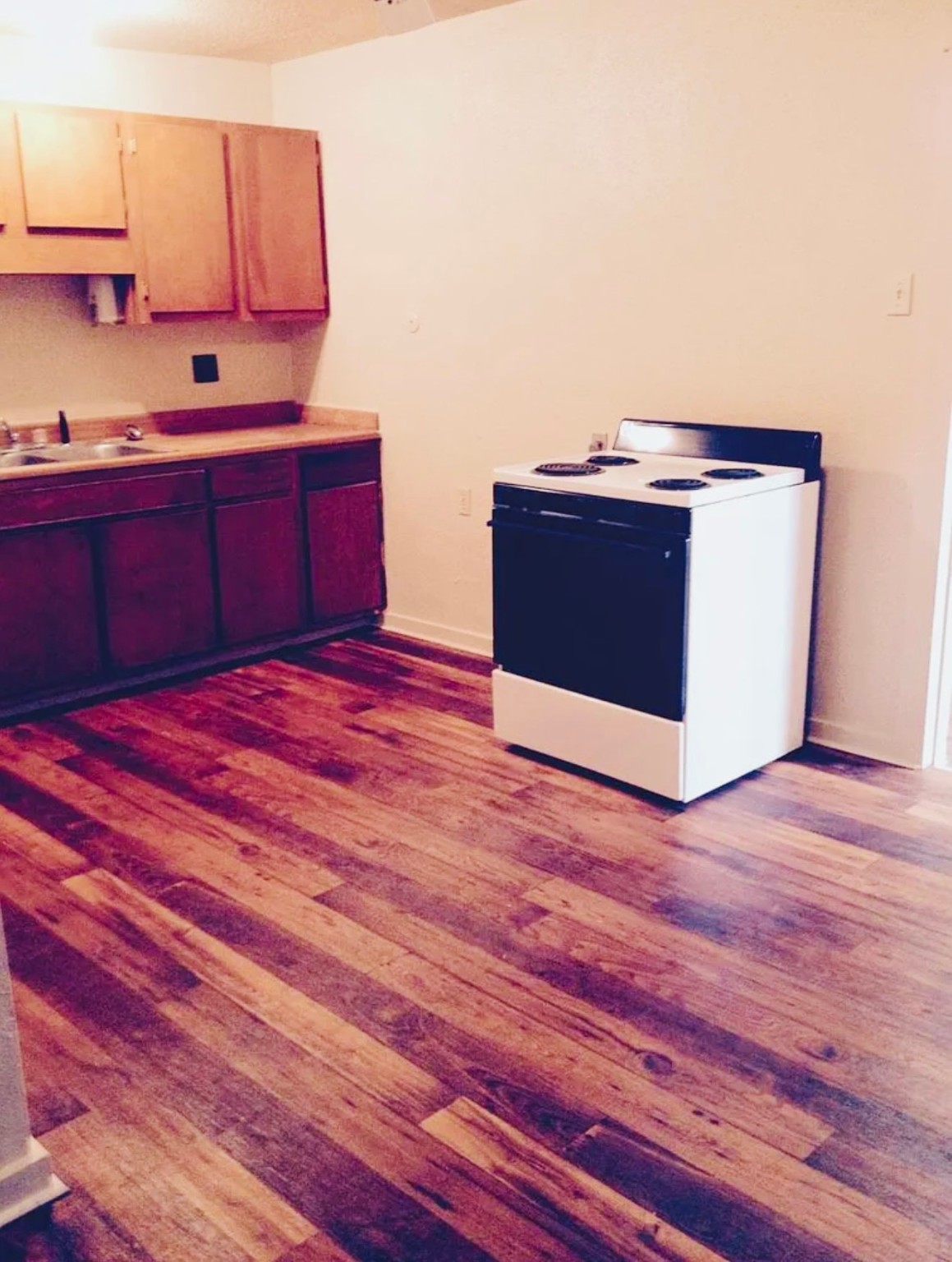 118 Robinson Road Oyster Creek, TX 77541 - Photo 8 of 8 a kitchen with stainless steel appliances granite countertop a sink stove and cabinets