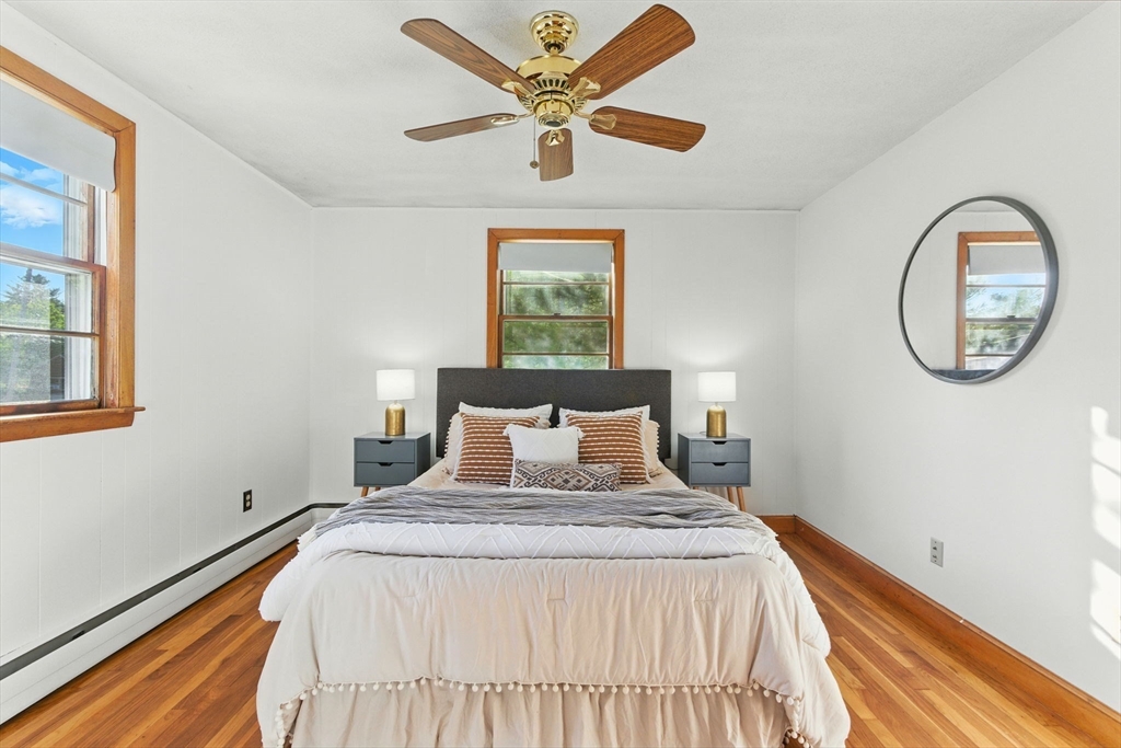 53 Park Street North Reading, MA 01864 - Photo 16 of 24 a bedroom with a bed and a large window