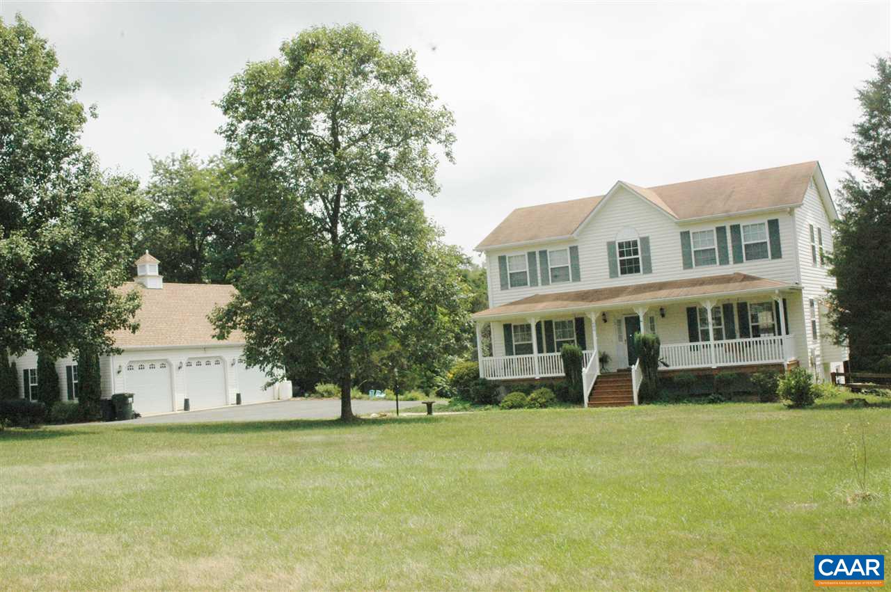 696 Valley View Road Ruckersville, VA 22968 - Photo 21 of 32 a view of a house with a garden and trees