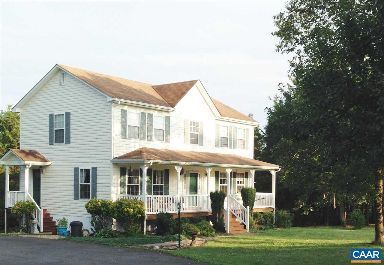 696 Valley View Road Ruckersville, VA 22968 - Photo 22 of 32 a front view of a house with a garden