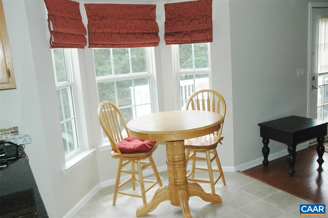 696 Valley View Road Ruckersville, VA 22968 - Photo 6 of 32 a dining room with furniture and windows
