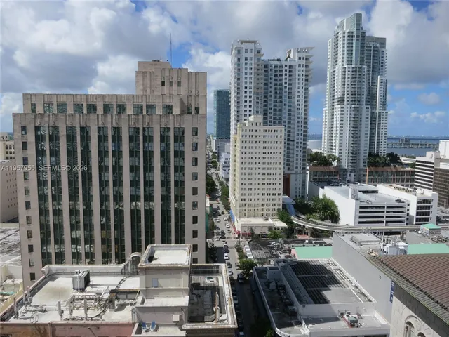 a view of a city with tall buildings
