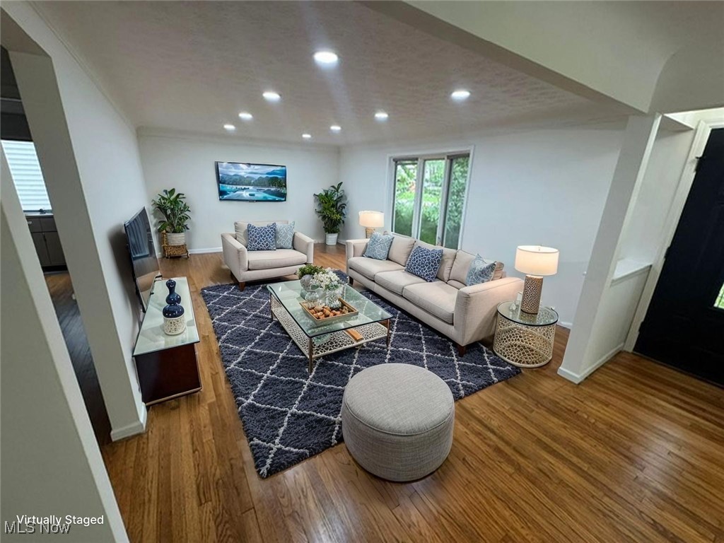 4018 Root Road North Olmsted, OH 44070 - Photo 12 of 23 Living room featuring recessed lighting and wood finished floors