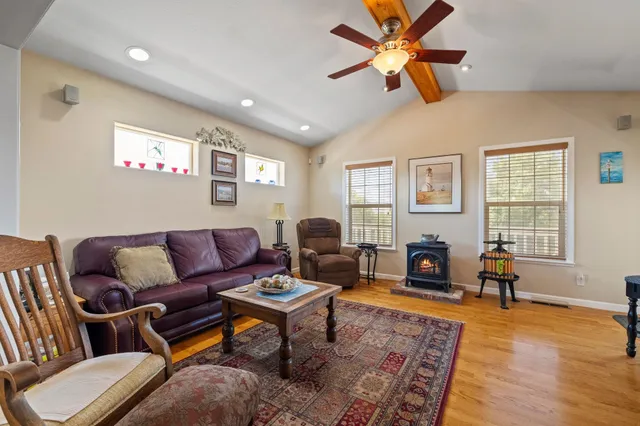 a view of a storage and utility room with washer and dryer
