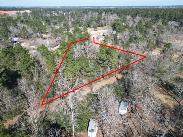 an aerial view of residential house with outdoor space