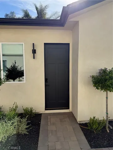 a view of entryway with a flower pot