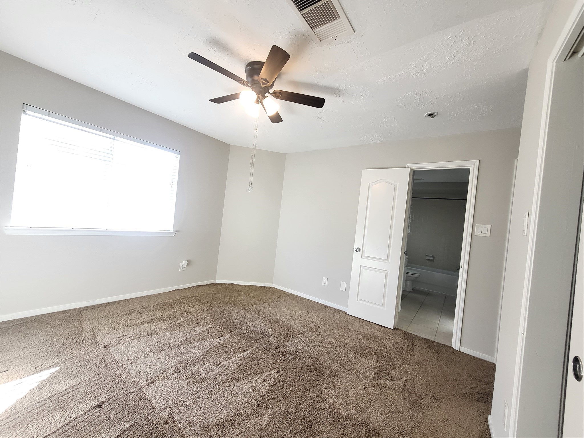 7415 Hollister Ridge Houston, TX 77040 - Photo 29 of 36 a view of an empty room with a window