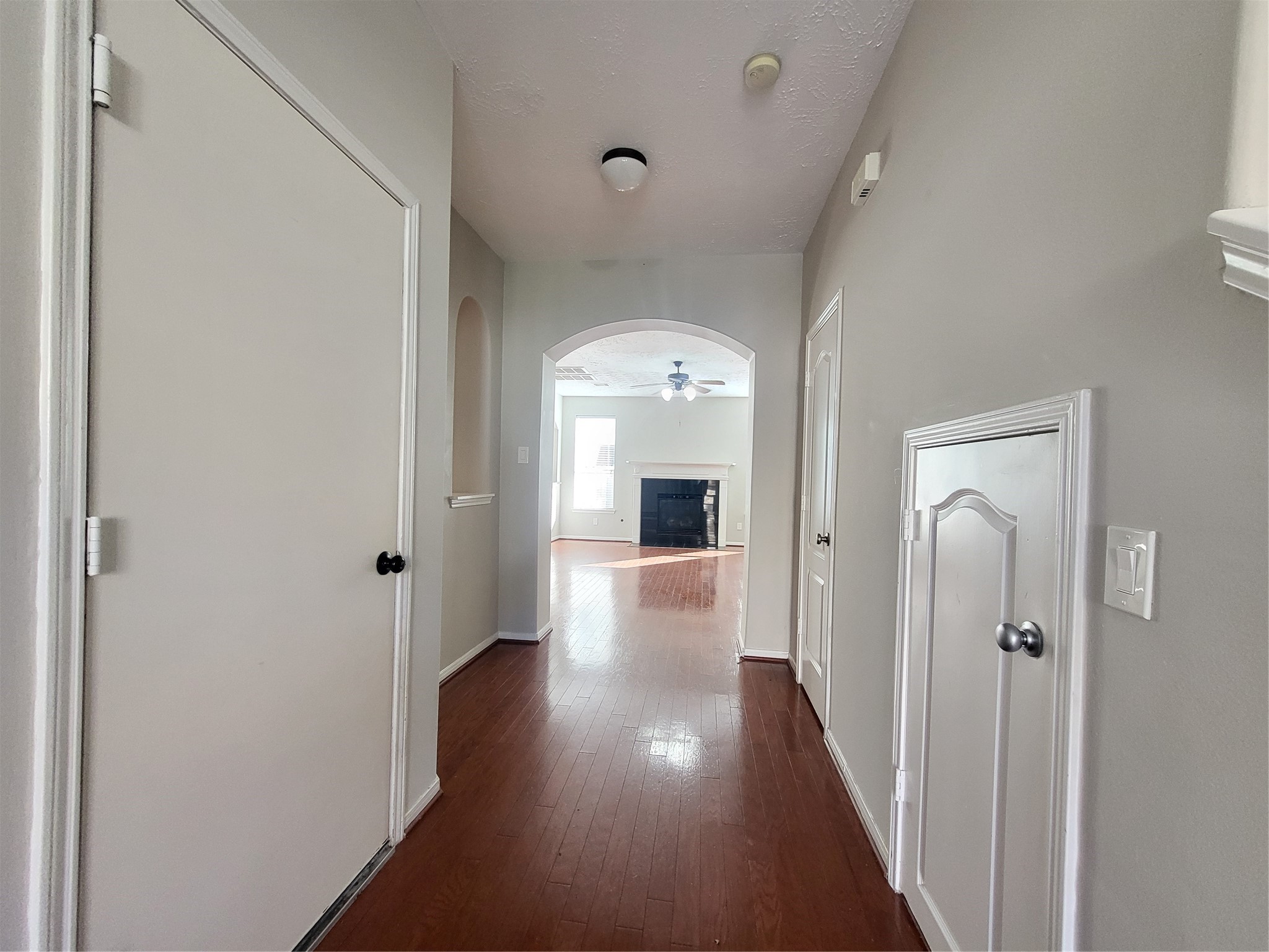 7415 Hollister Ridge Houston, TX 77040 - Photo 4 of 36 a view of a hallway with wooden floor and staircase