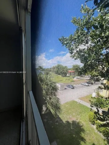 a view of a lake from a balcony