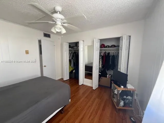 a view of a livingroom with a hardwood floor