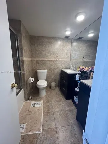 a bathroom with a sink and a toilet