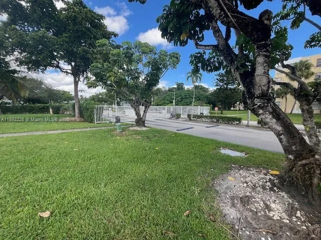 a view of a park and trees