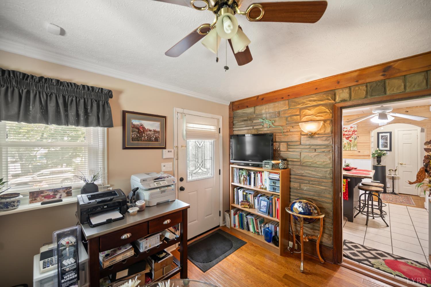 232 Elon Road Madison Heights, VA 24572 - Photo 27 of 65 Dedicated office featuring hardwood floors and convenient access to the main living areas with a private entrance.