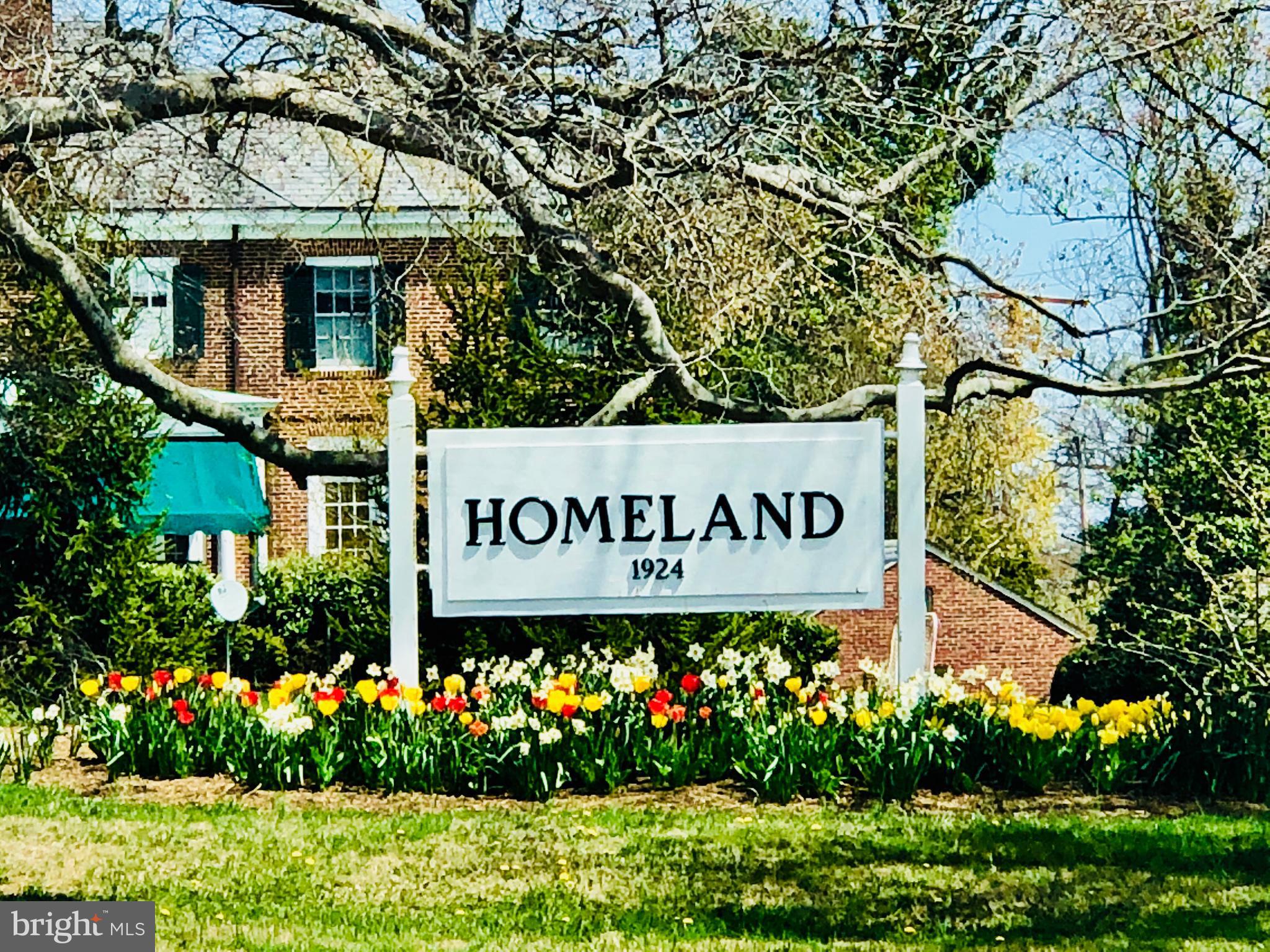 5302 Springlake Way Baltimore, MD 21212 - Photo 35 of 35 a sign broad in front of flowers