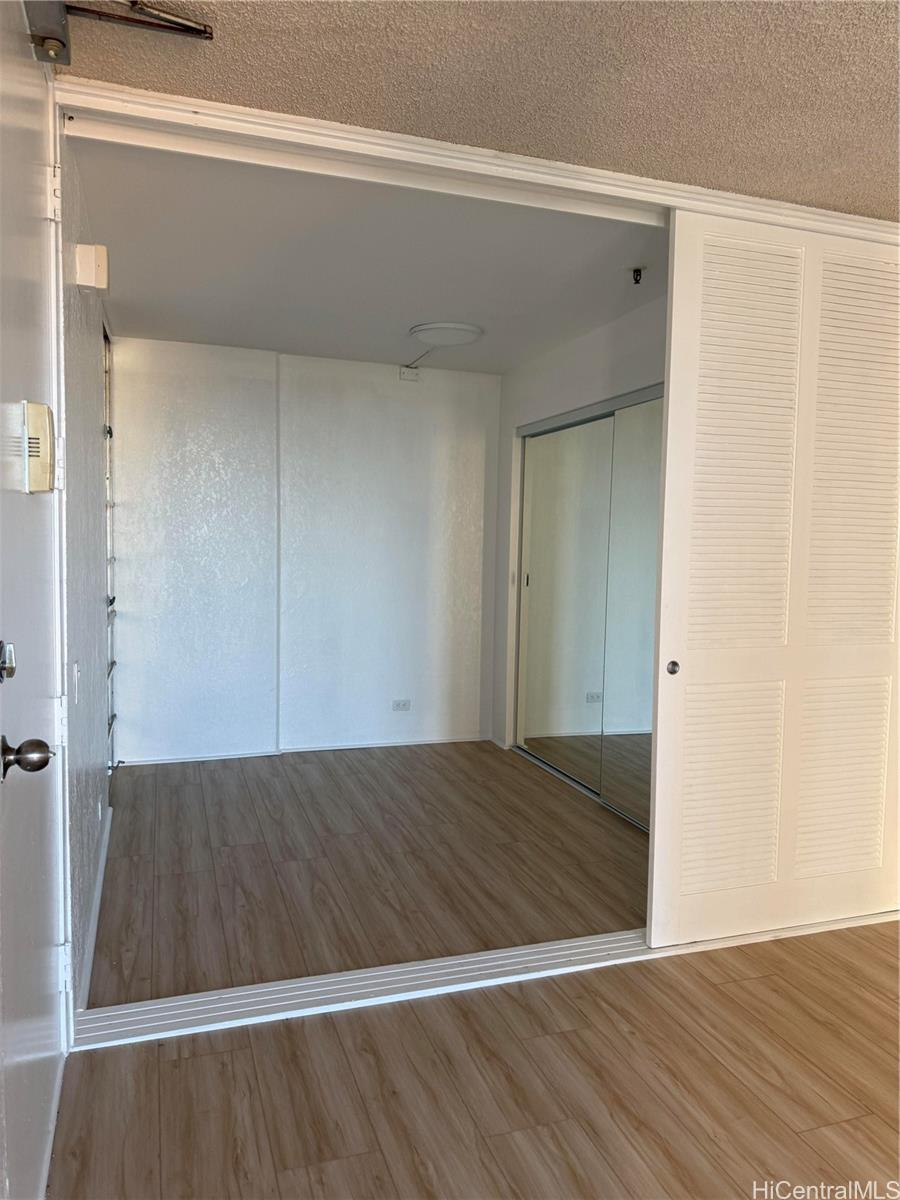 1226 Alexander Street, Unit 505 Honolulu, HI 96826 - Photo 18 of 24 a view of wooden floor