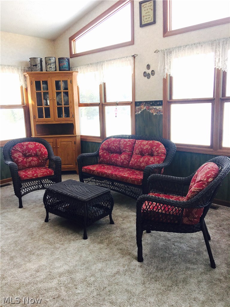 3441 Greenwich Road Wadsworth, OH 44281 - Photo 15 of 35 Sunroom with cathedral ceiling, gas fireplace & doors leading to the outside patio