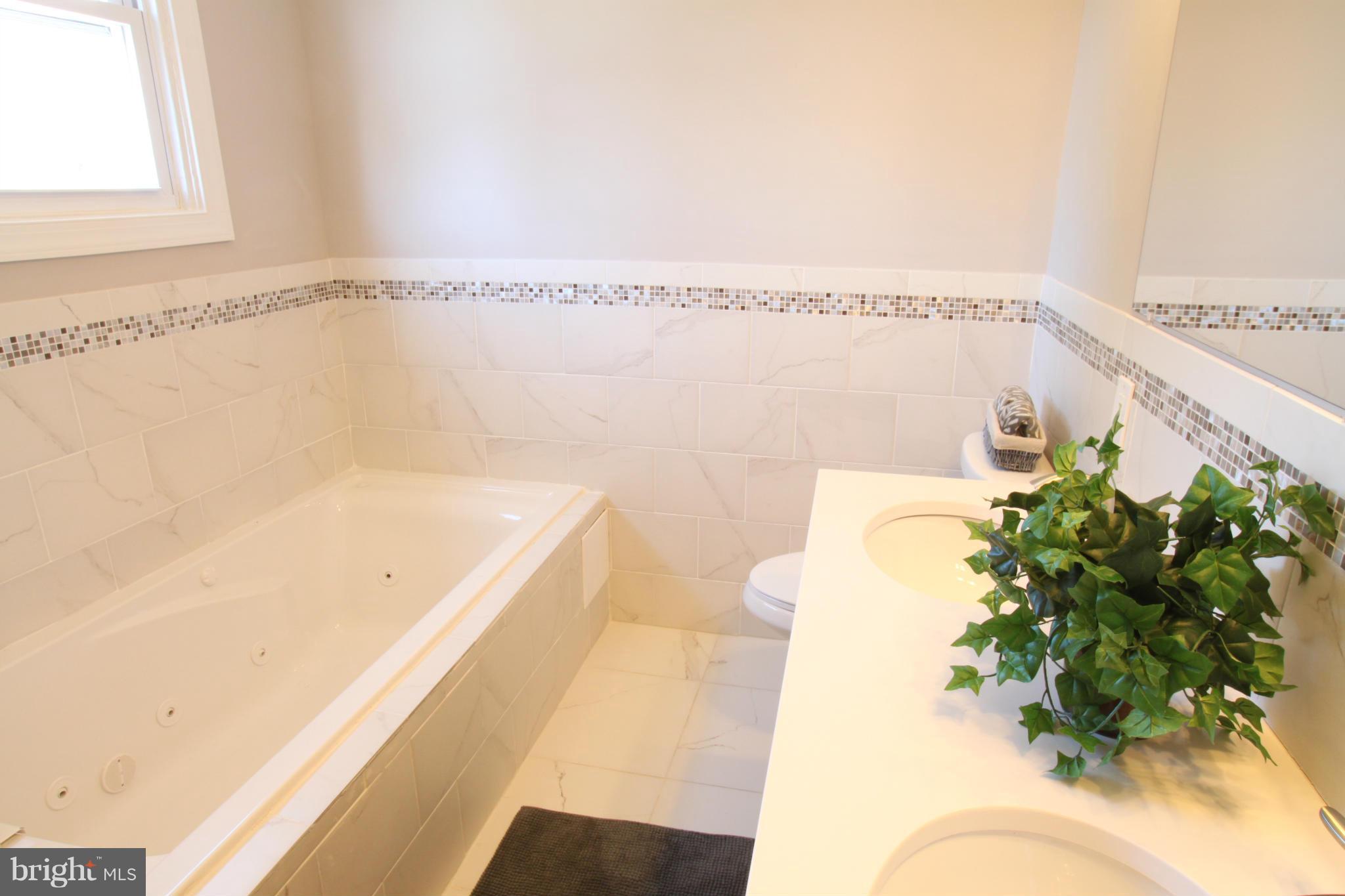2608 Ken Oak Road Baltimore, MD 21215 - Photo 14 of 25 Whirlpool tub & Double Vanity