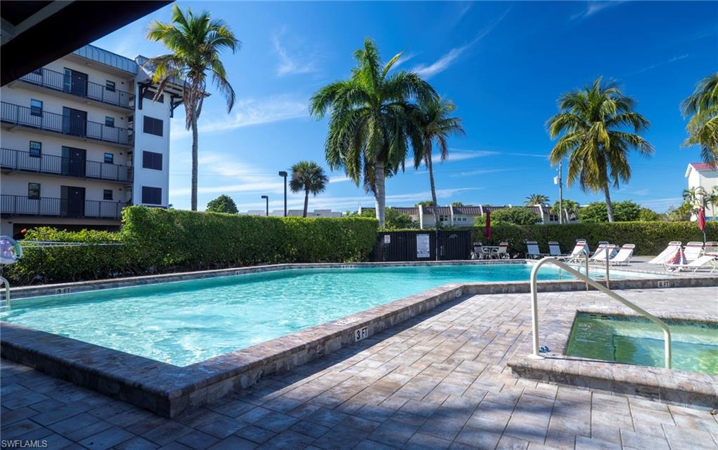 803 River Point Drive, Unit 105B Naples, FL 34102 - Photo 34 of 36 a view of a backyard with a patio