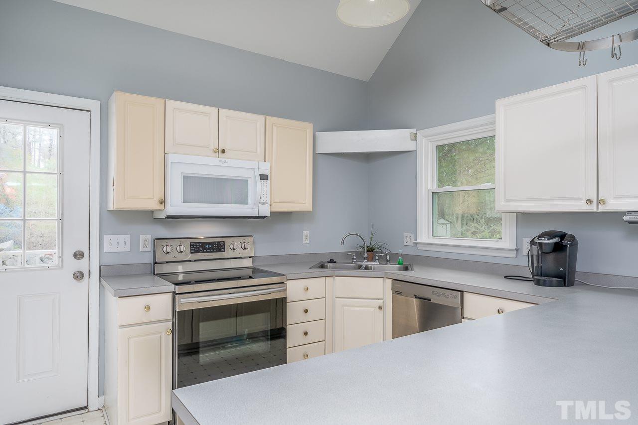 6916 Spring Drive Raleigh, NC 27613 - Photo 7 of 21