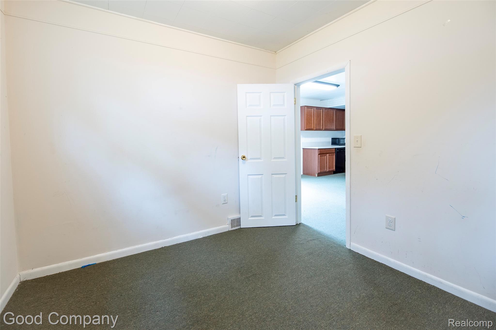 3685 Cone Avenue Rochester, MI 48309 - Photo 5 of 23 Neutral wall finishes, white trim, and a white interior door