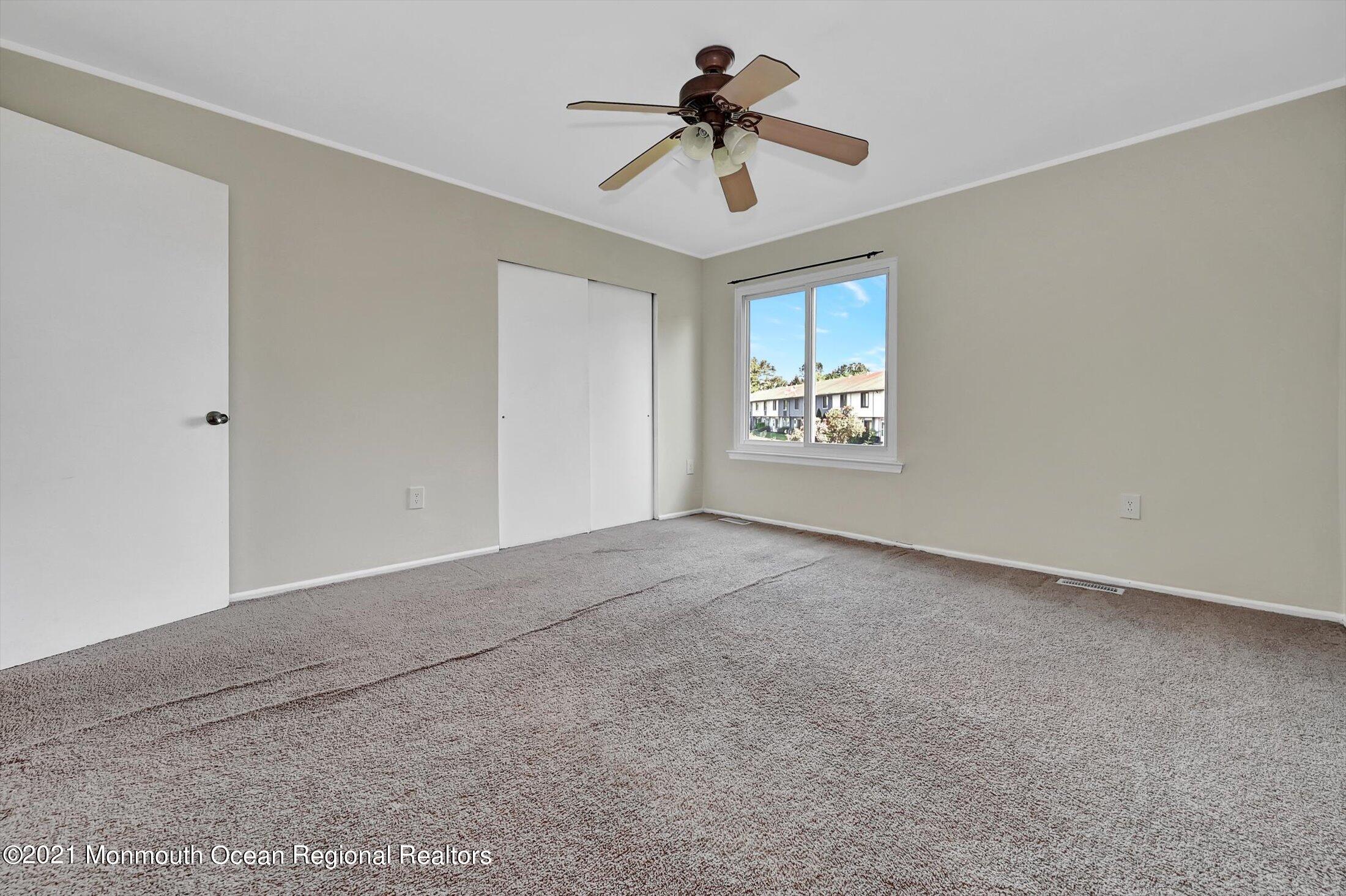 7 Creek Road Brick, NJ 08724 - Photo 11 of 14 a view of an empty room with a window