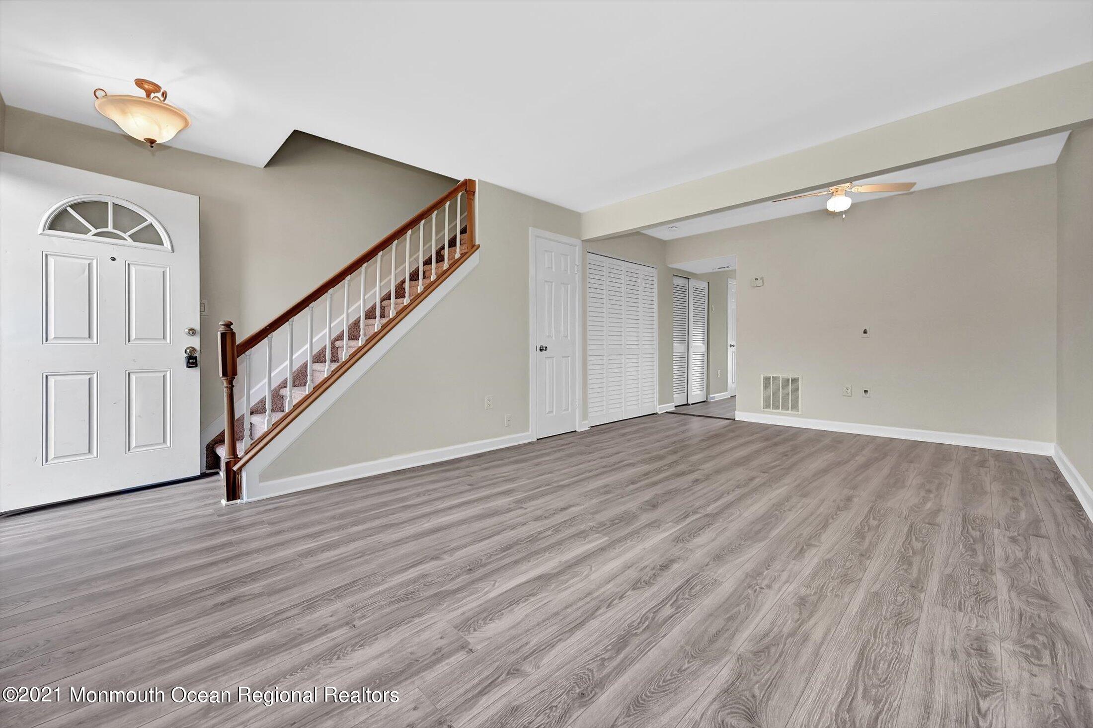 7 Creek Road Brick, NJ 08724 - Photo 4 of 14 a view of an entryway with wooden floor