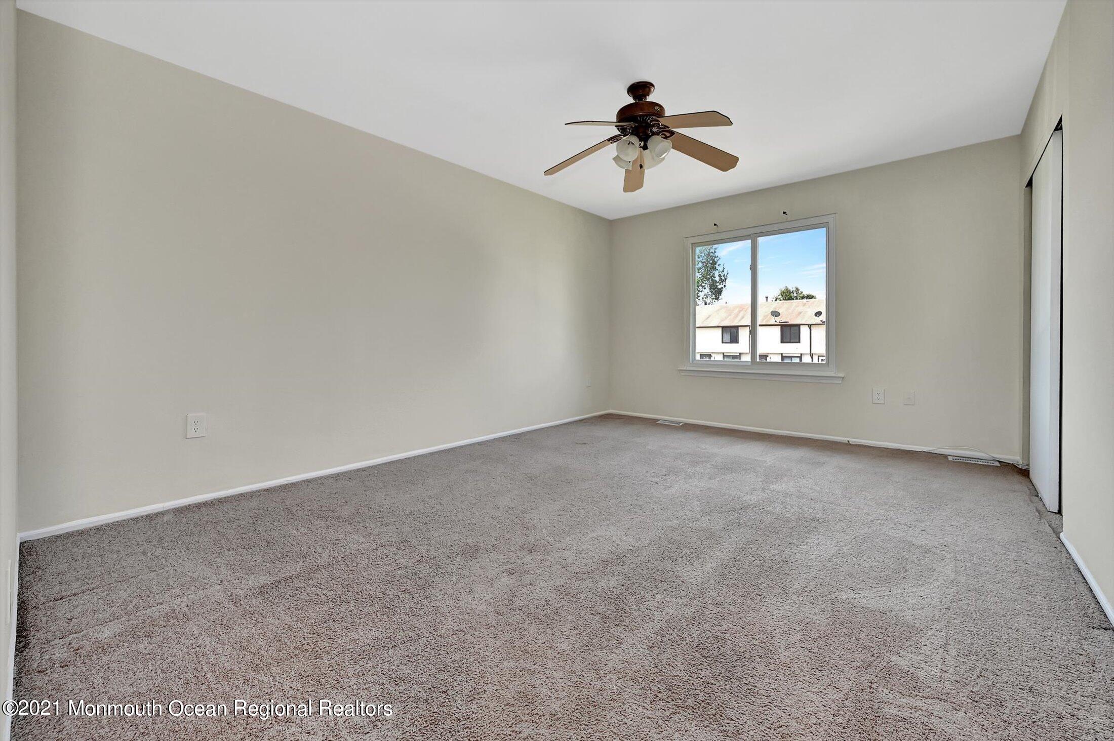 7 Creek Road Brick, NJ 08724 - Photo 10 of 14 a view of an empty room with a window