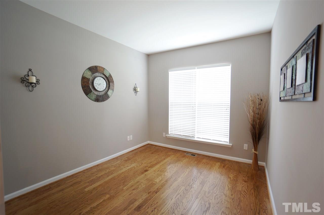 7730 San Gabriel Street Raleigh, NC 27613 - Photo 12 of 25 Home office has French doors and a cozy feel.