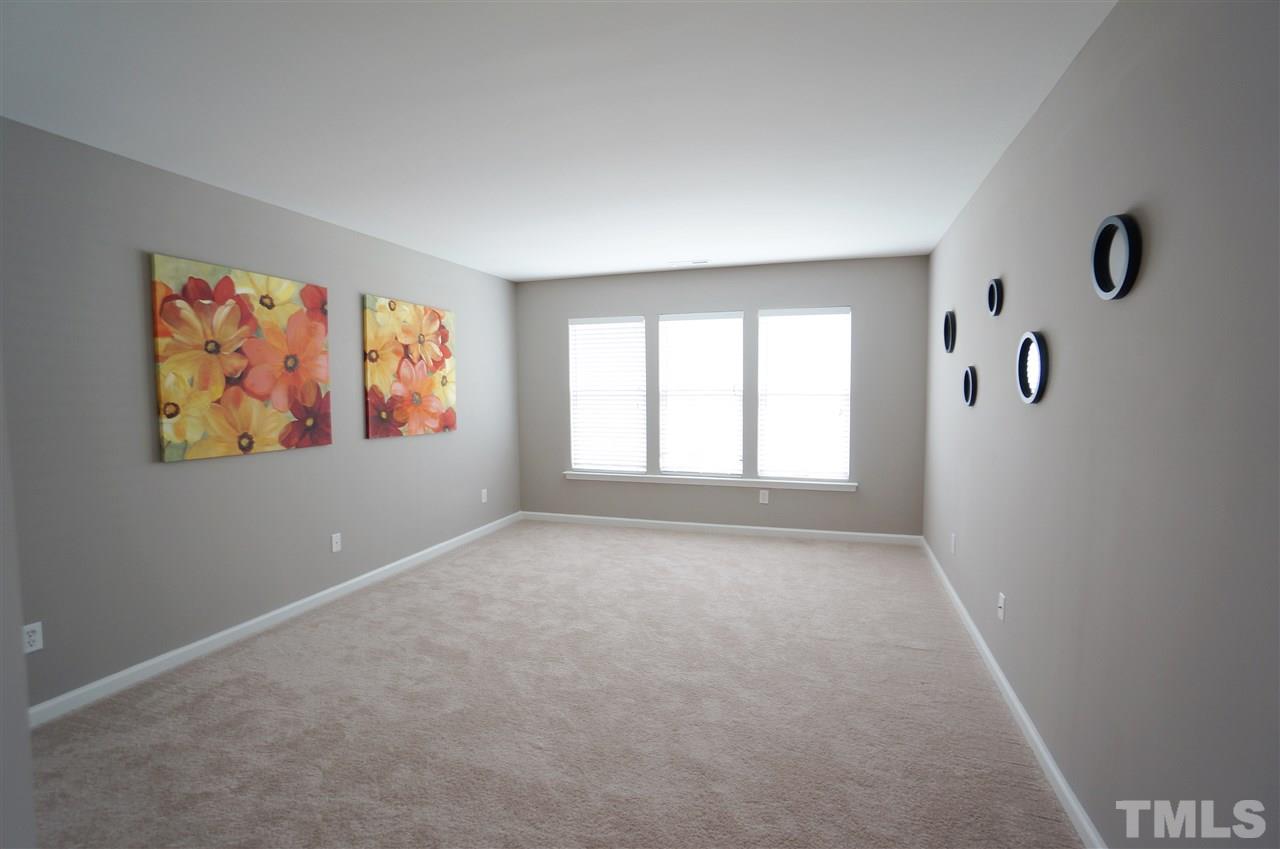 7730 San Gabriel Street Raleigh, NC 27613 - Photo 17 of 25 Bright & spacious bedrooms provide ample space & versatility for your ever changing & growing needs.
