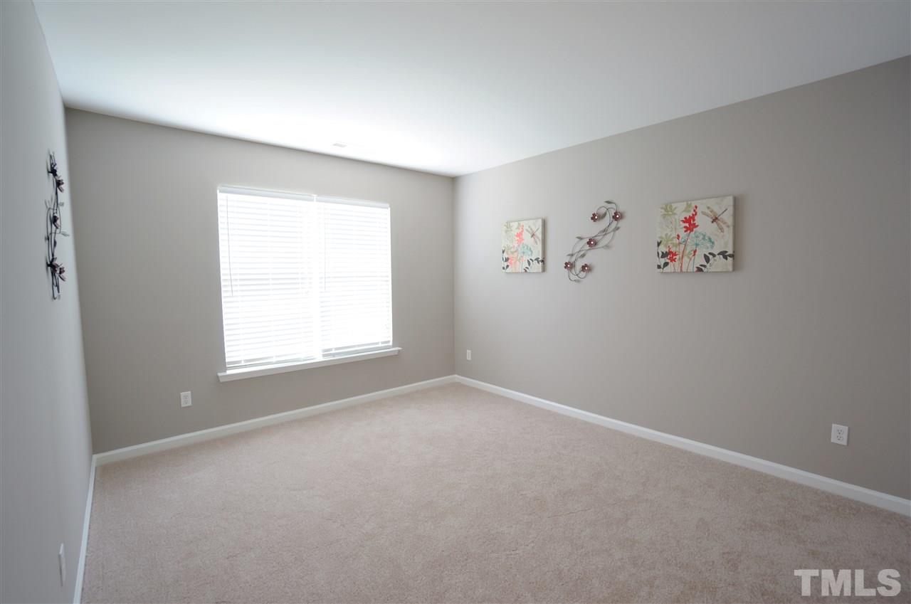 7730 San Gabriel Street Raleigh, NC 27613 - Photo 20 of 25 Bright & spacious bedrooms provide ample space & versatility for your ever changing & growing needs.