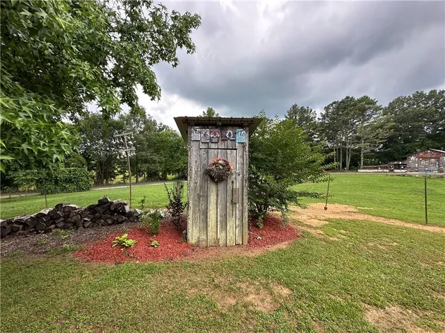 a view of a backyard with a garden