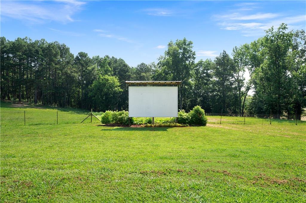 669 Nicklesville Road Northeast Resaca, GA 30735 - Photo 17 of 60 a view of a backyard with a garden