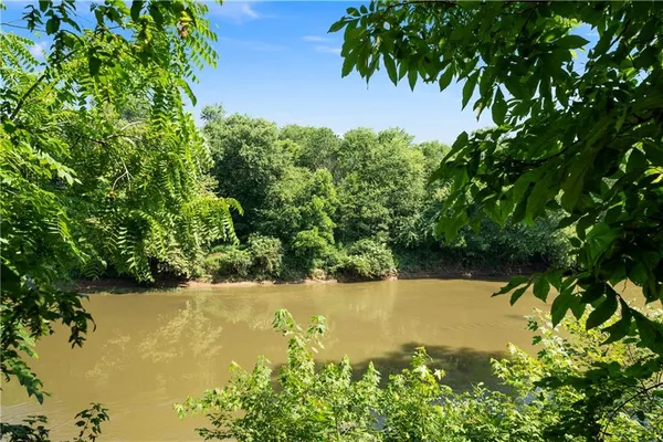 a view of a pathway with a patio