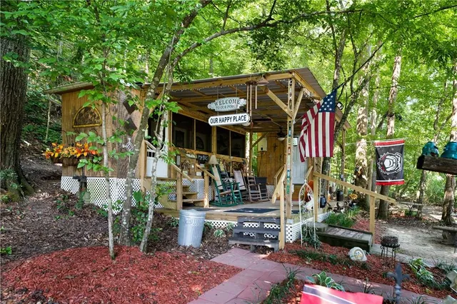 a view of a chairs and table in a patio